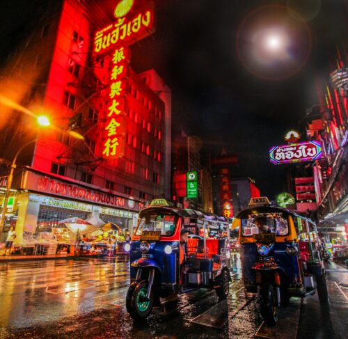 Two auto rickshaws on the street in Bangkok Thailand
