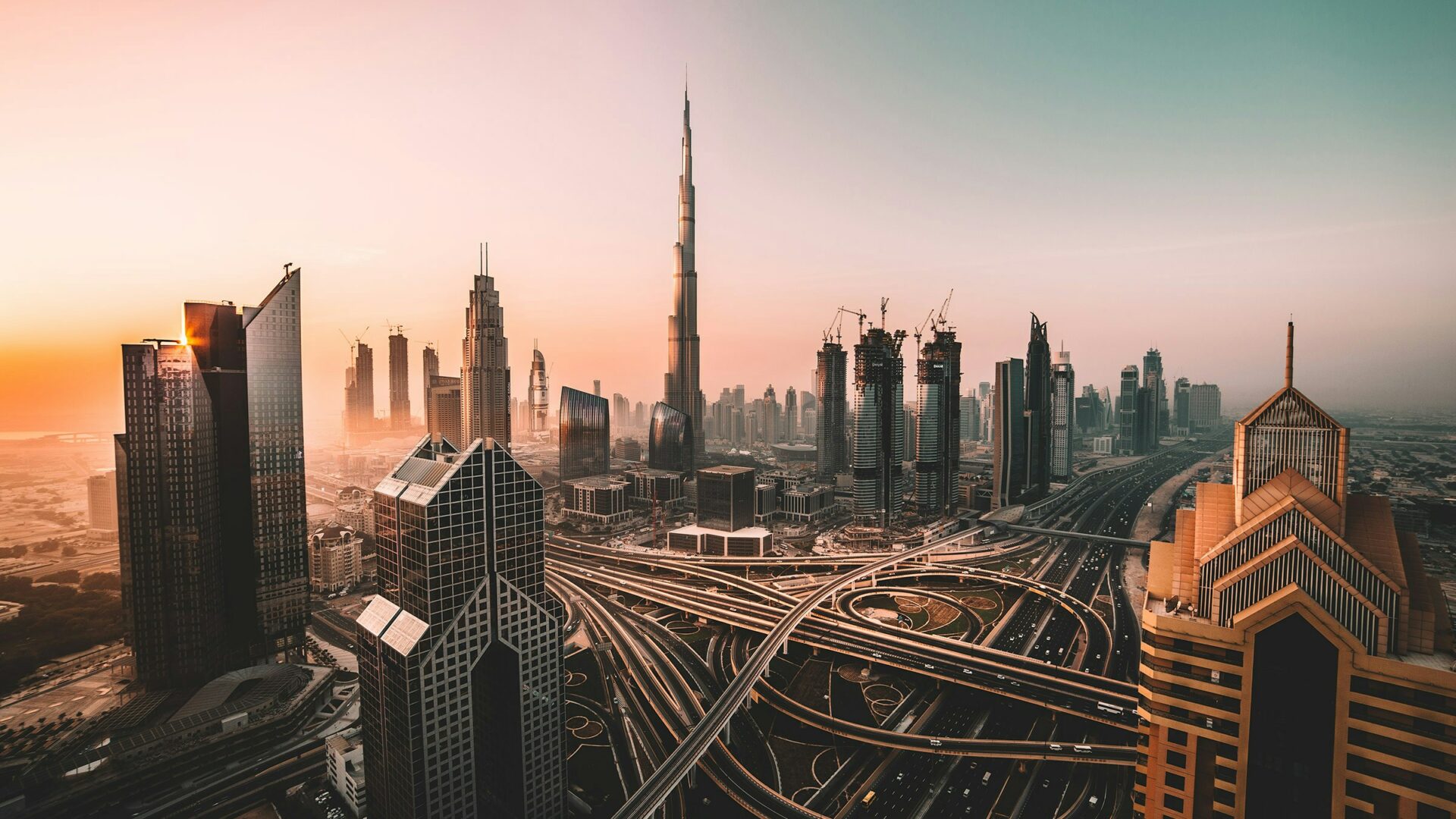 Aerial view of Dubai skyline with skyscrapers and highway, United Arab Emirates