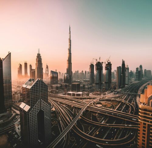 Aerial view of Dubai skyline with skyscrapers and highway, United Arab Emirates