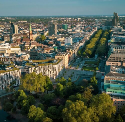 Aerial view of Dusseldorf Germany skyline along the Rhine River with modern buildings and bridges, North Rhine-Westphalia