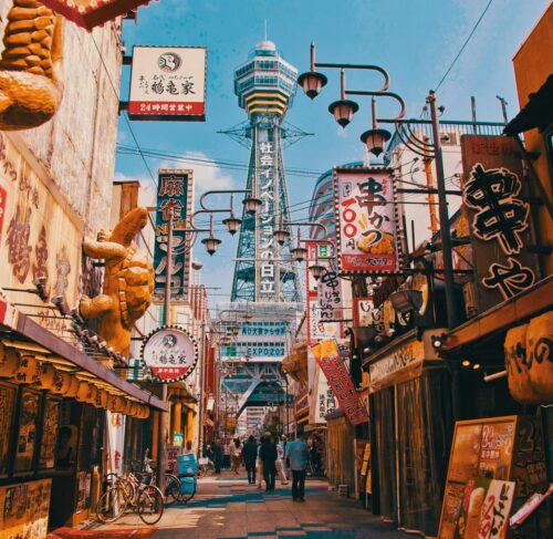 Street scene in Osaka Japan with pedestrians walking during daytime