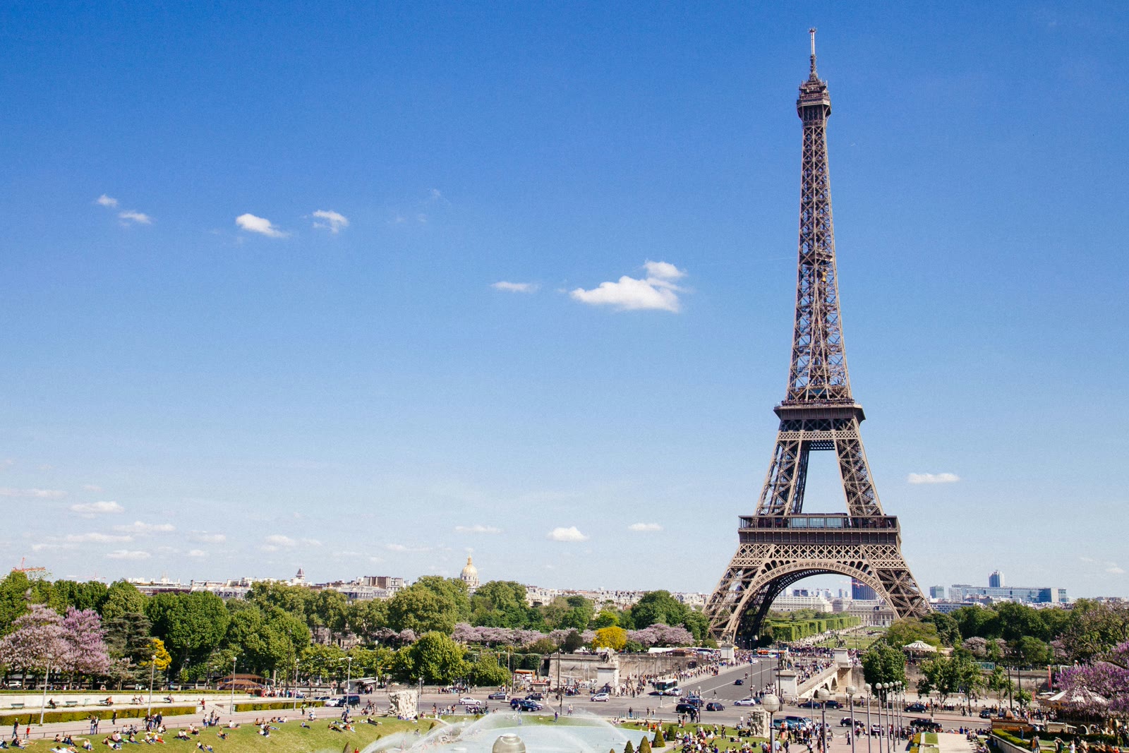 Eiffel Tower in Paris, France against a bright sky