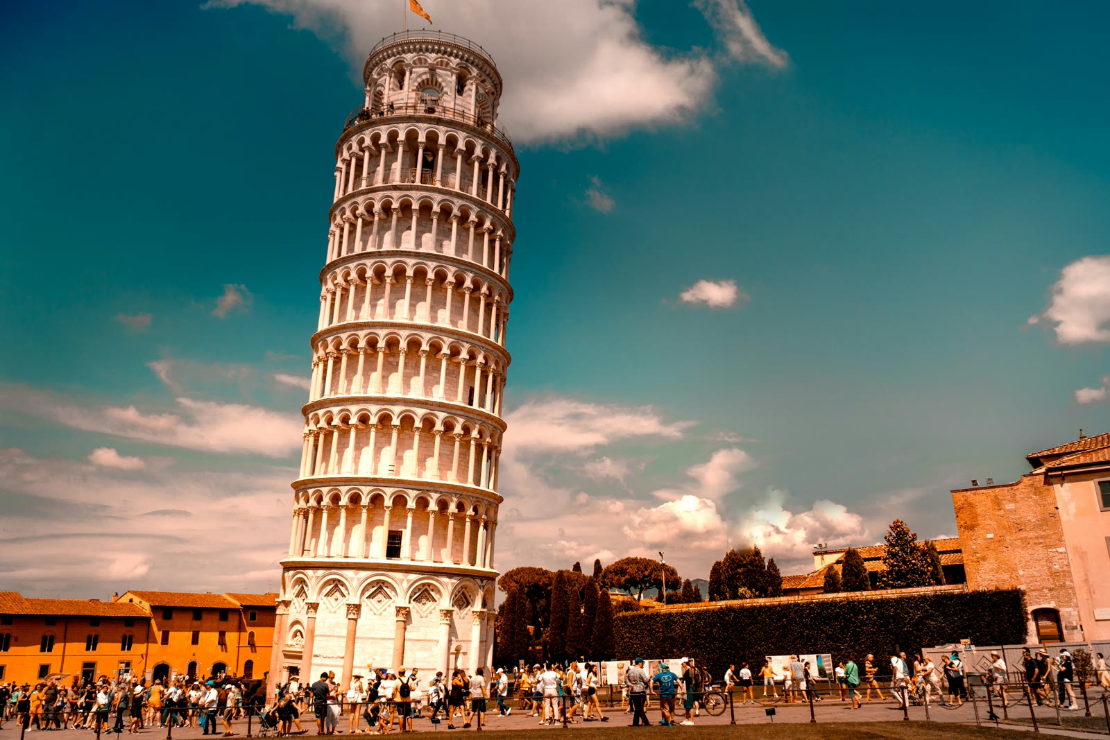 Aerial view of the Leaning Tower of Pisa and Piazza dei Miracoli with tourists, Tuscany, Italy