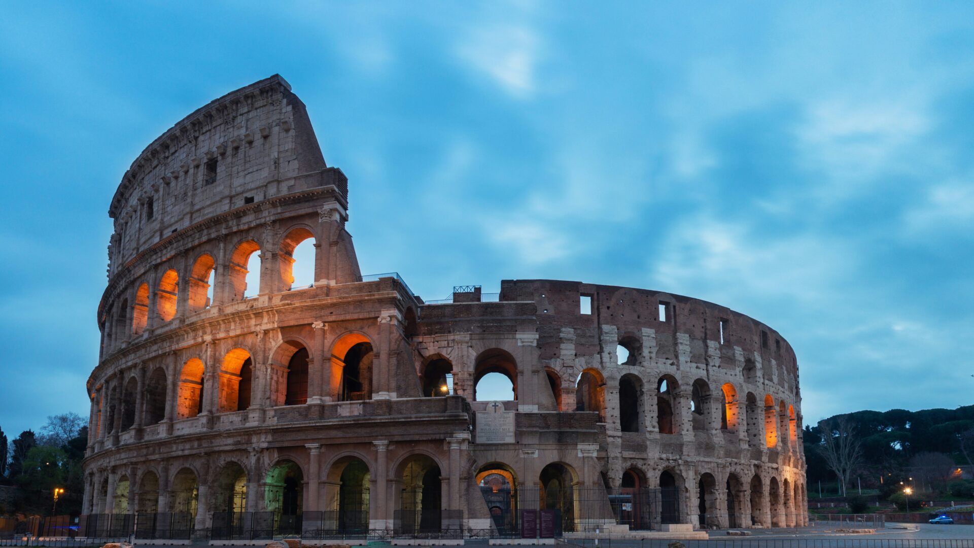 Aerial view of the Colosseum in Rome at golden hour