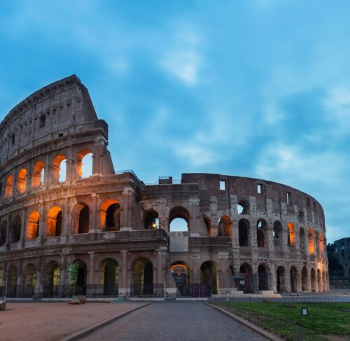 Aerial view of the Colosseum in Rome at golden hour
