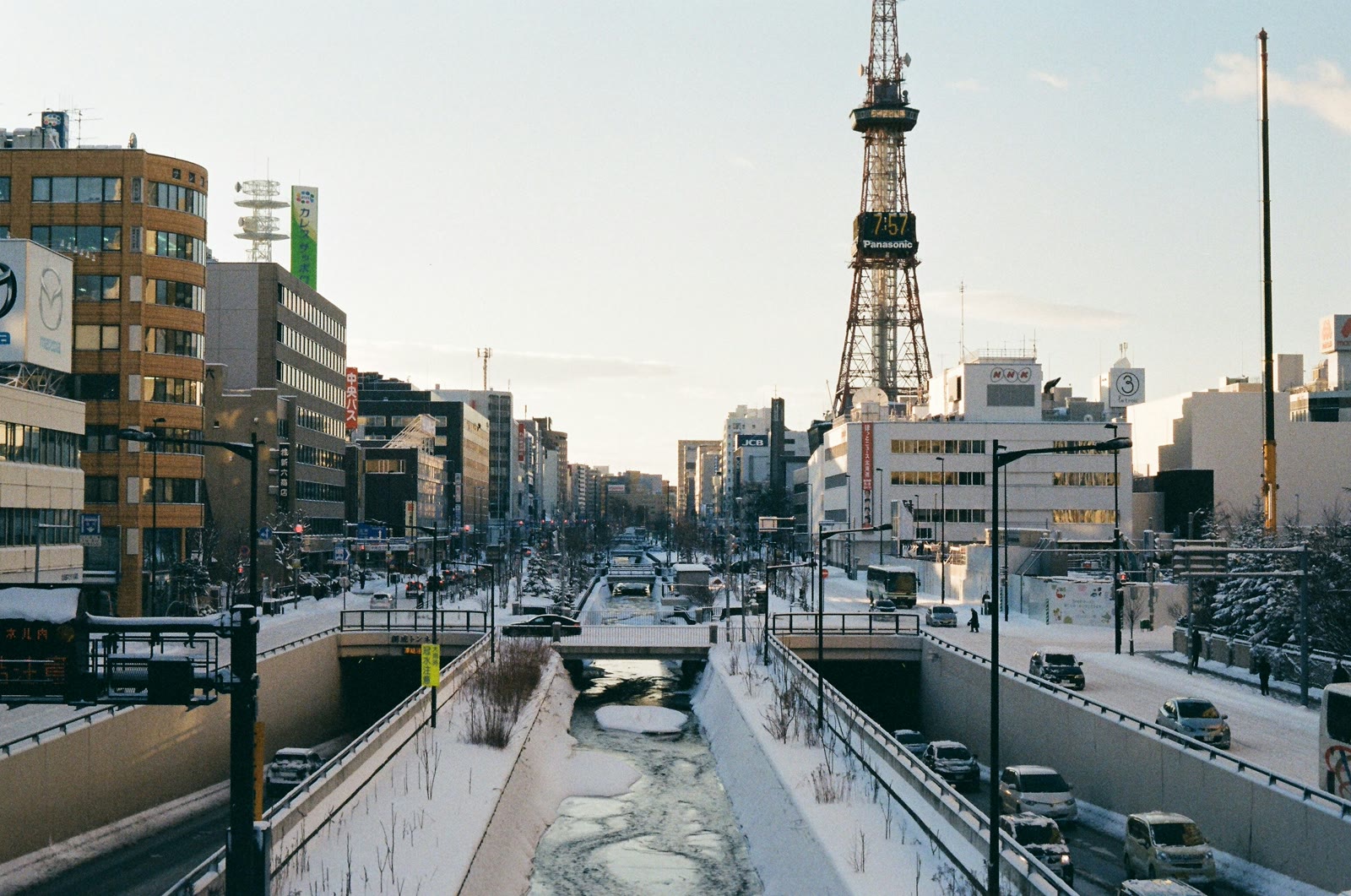White and black ferry boat docked at Sapporo harbor pier in Hokkaido Japan