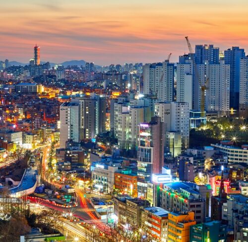 Aerial view of Seoul cityscape at night with illuminated skyscrapers, South Korea