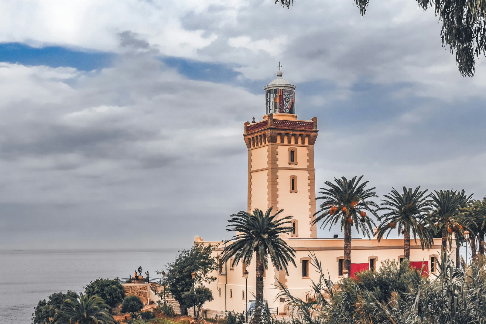 Historic clock tower landmark in Tangier Morocco with traditional architecture against blue sky, North Africa