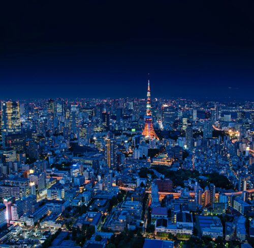 Aerial night view of Tokyo city skyline with illuminated buildings and streets
