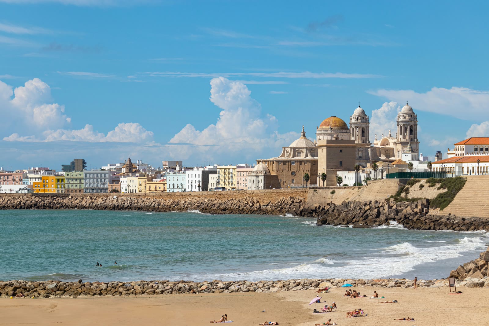 Beach and cityscape of Cadiz with waterfront buildings, Andalusia, Spain