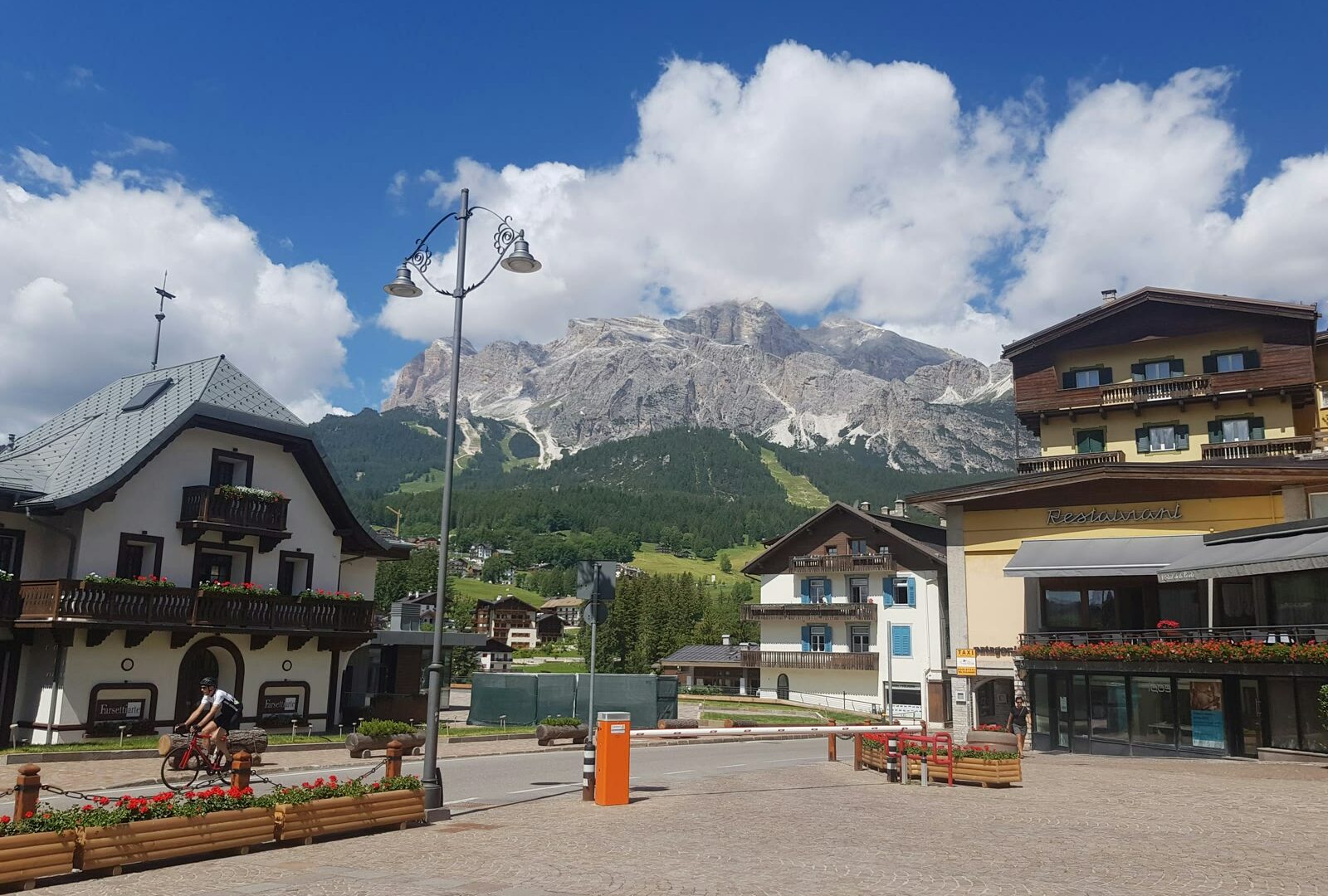 Town square of Cortina d'Ampezzo with Dolomites mountains in the background, Trentino-Alto Adige, Italy