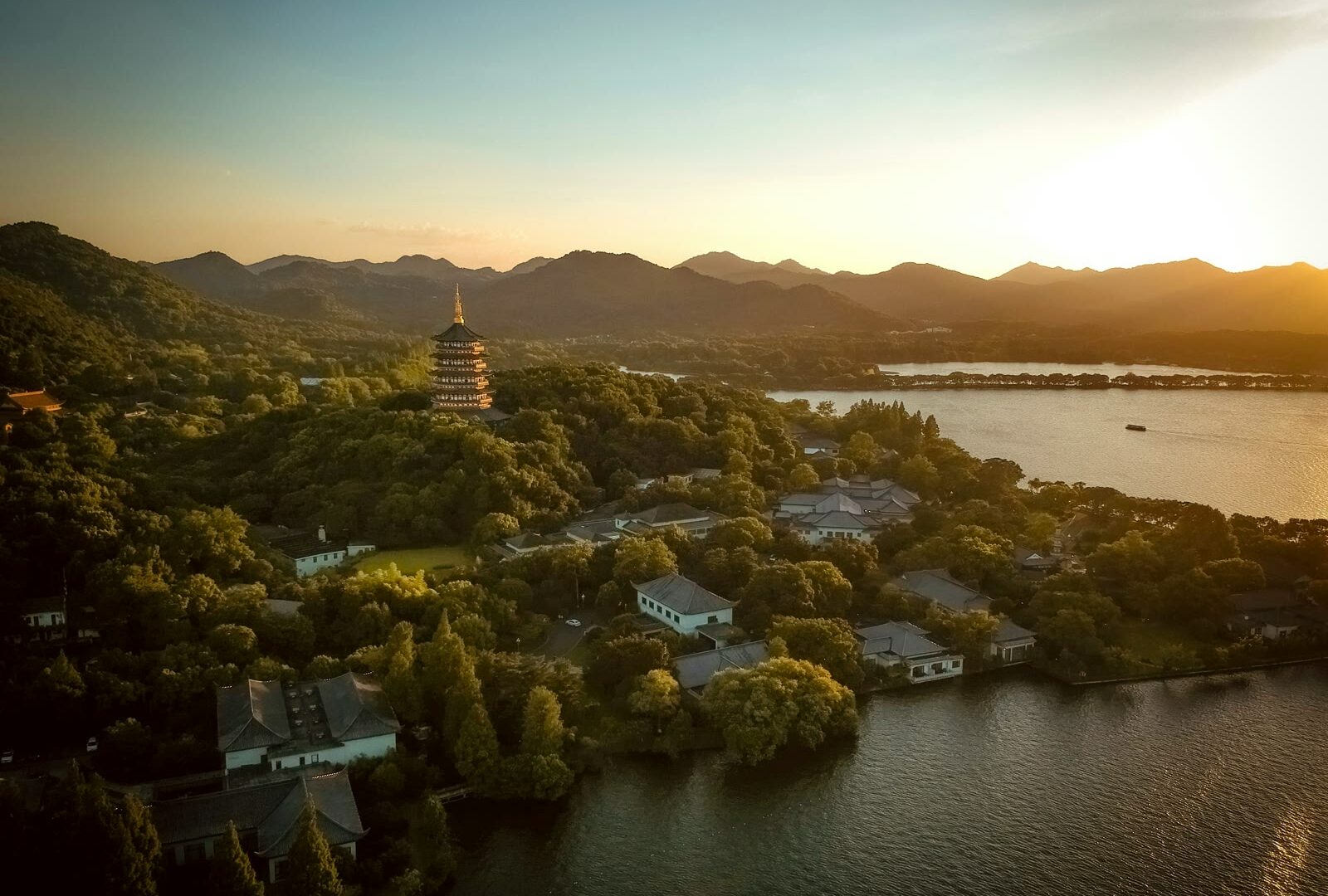 West Lake scenic view with traditional pagoda and trees, Hangzhou, Zhejiang, China