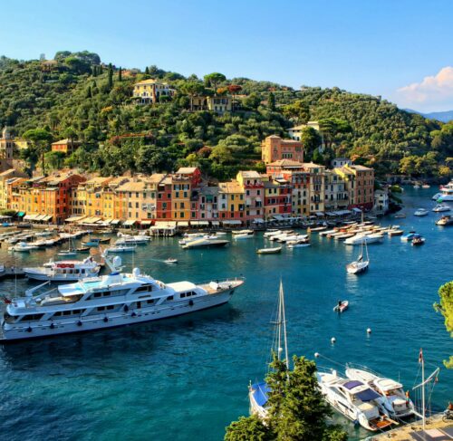White yacht at the harbor near Portofino village, Liguria, Italy