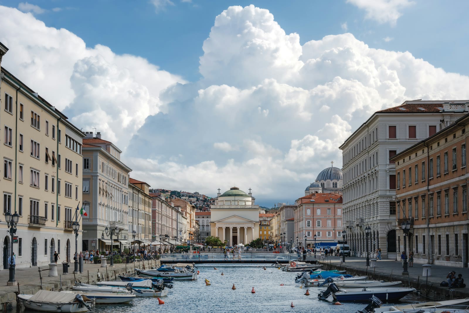 Canal Grande waterfront with boats and historic buildings in Trieste, Friuli-Venezia Giulia, Italy