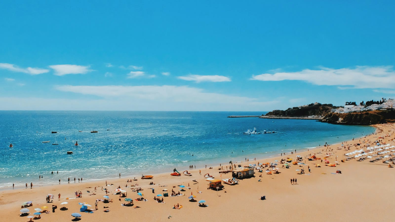 People near the seashore in Albufeira, Algarve, Portugal