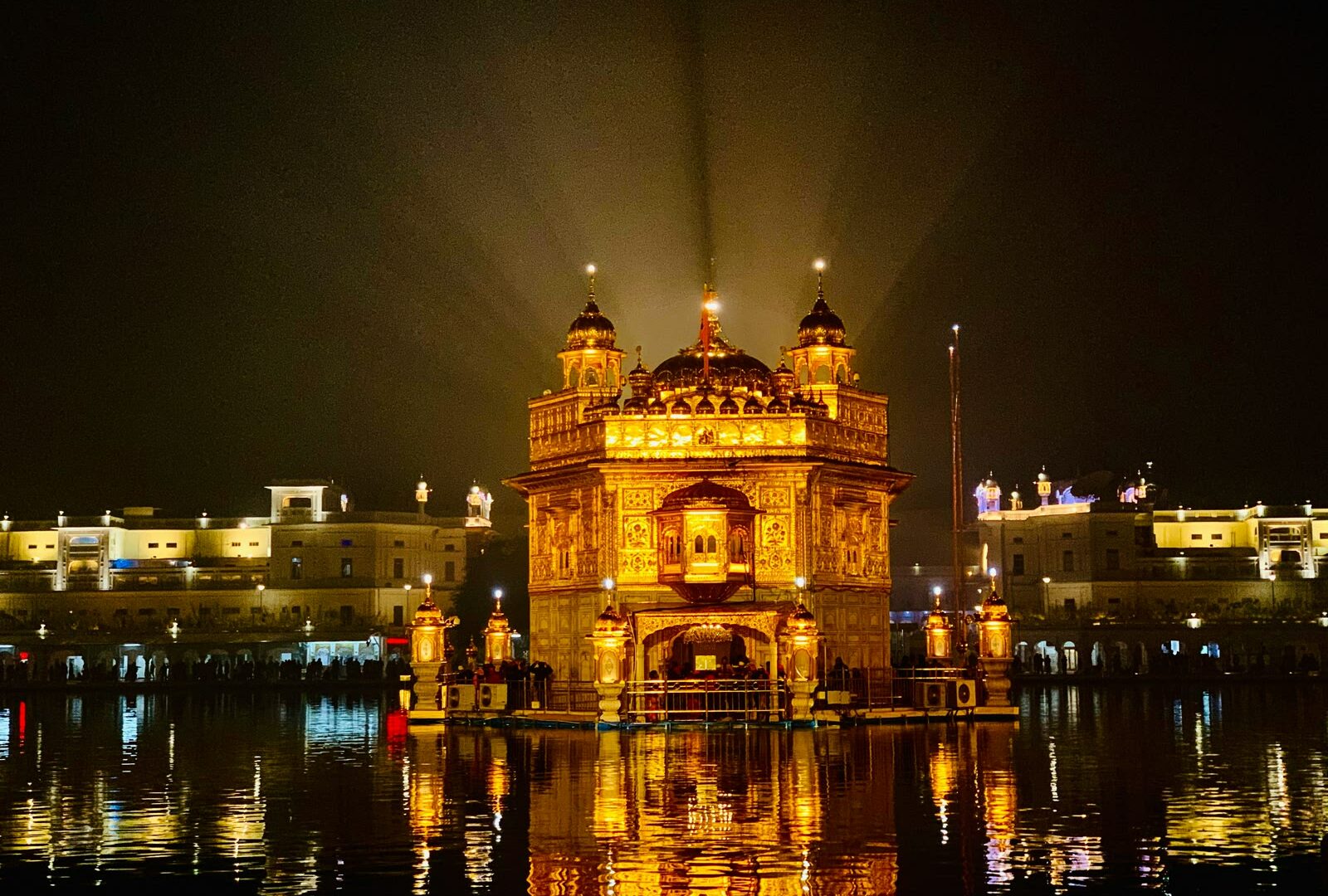 Golden Temple illuminated at night in Amritsar, Punjab, India