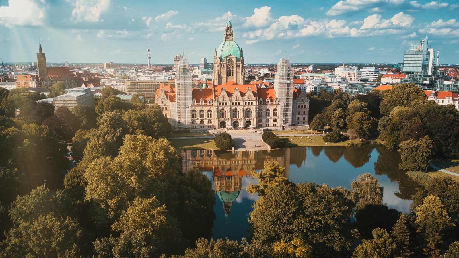 Building near green trees and water in Hanover, Lower Saxony, Germany