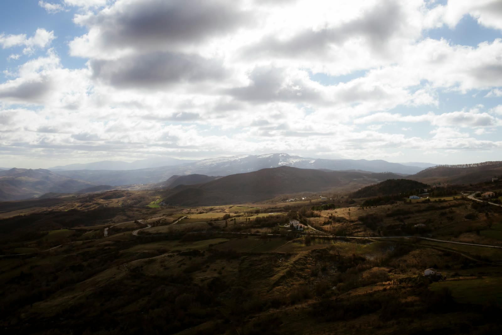 Brown mountains under white clouds in Isernia, Molise, Italy