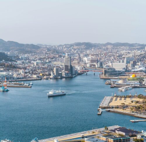 Large body of water surrounded by city in Nagasaki, Nagasaki, Japan
