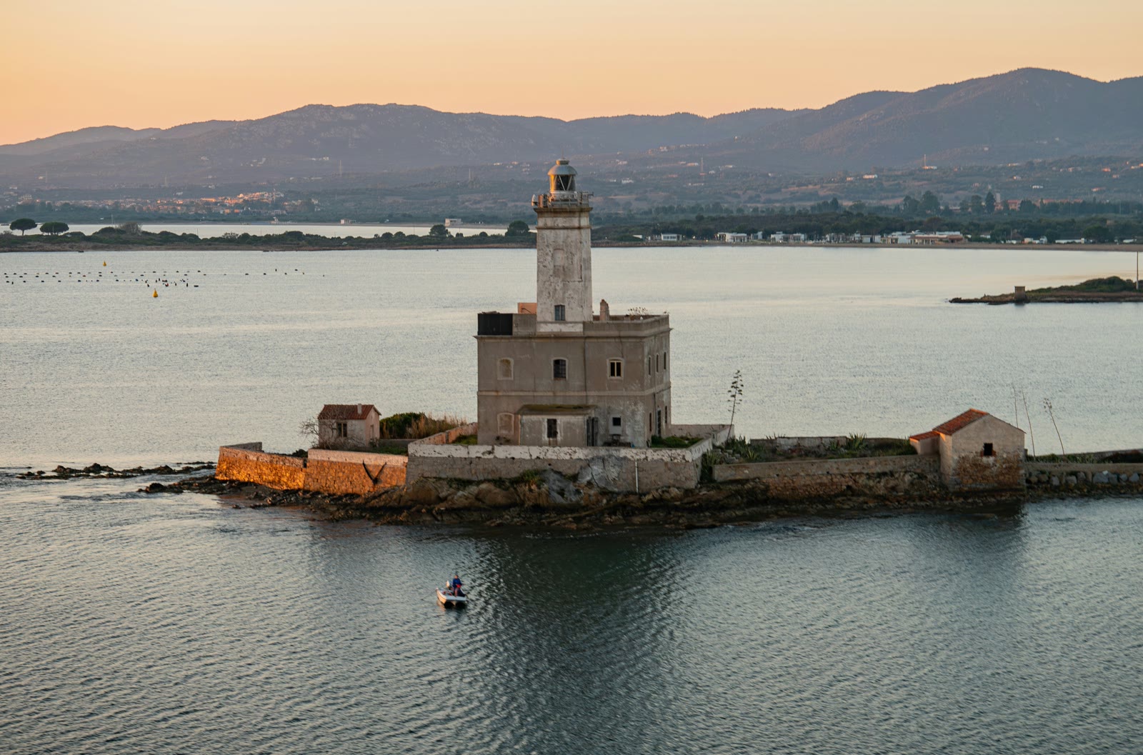 Lighthouse on a small island in the Mediterranean Sea, Olbia, Sardinia, Italy