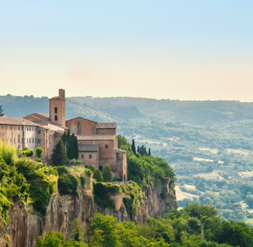 Small town on a cliff surrounded by trees in Orvieto, Umbria, Italy