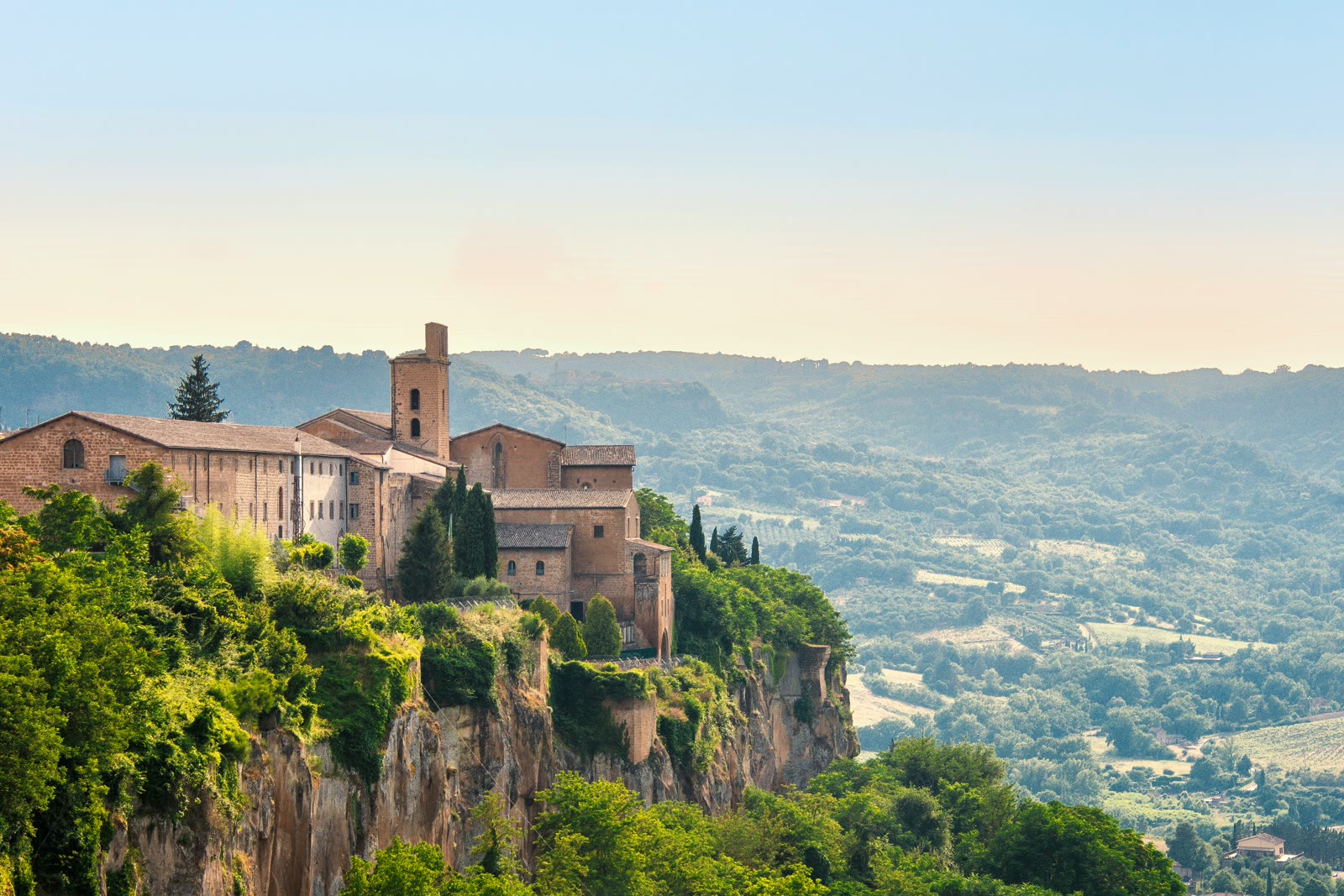 Small town on a cliff surrounded by trees in Orvieto, Umbria, Italy