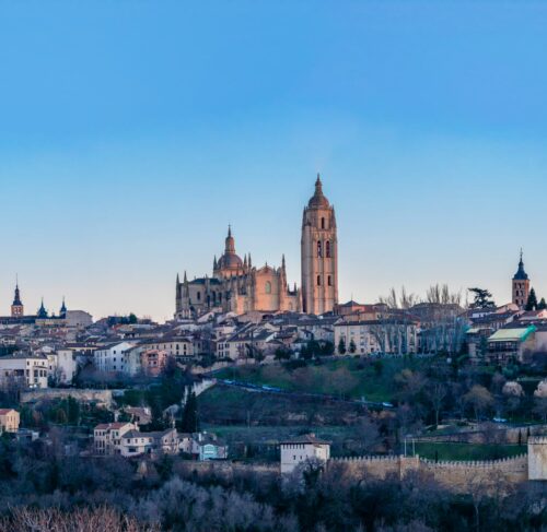 View of Segovia city with mountains in background, Castile and Leon, Spain
