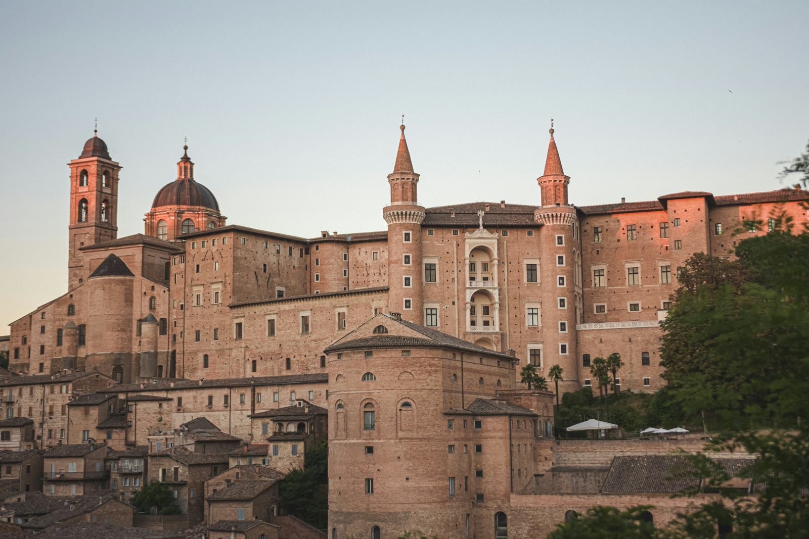 Grand building with dome overlooking Urbino in Marche, Italy