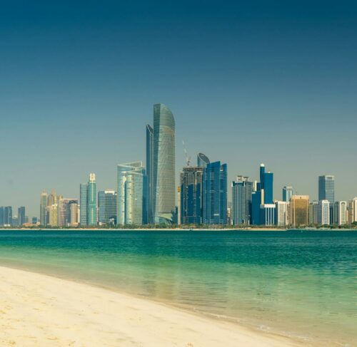 City skyline across the sea in Abu Dhabi, United Arab Emirates