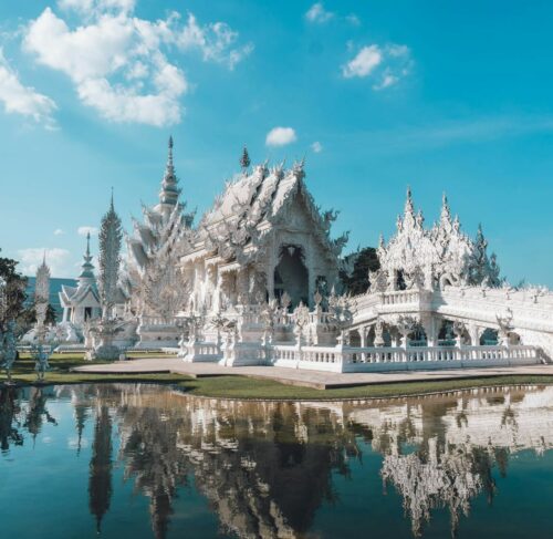 Large white building by the water in Chiang Rai, Thailand
