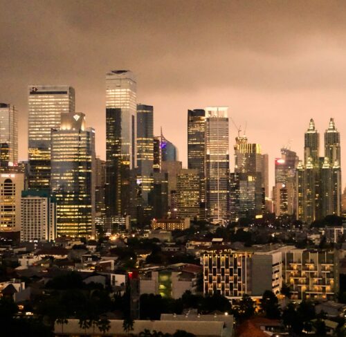City with skyscrapers at night in Jakarta, Indonesia