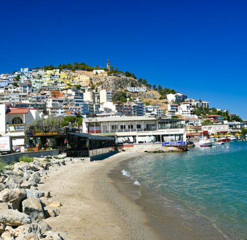 Beach with buildings in Kusadasi, Aydin, Turkey