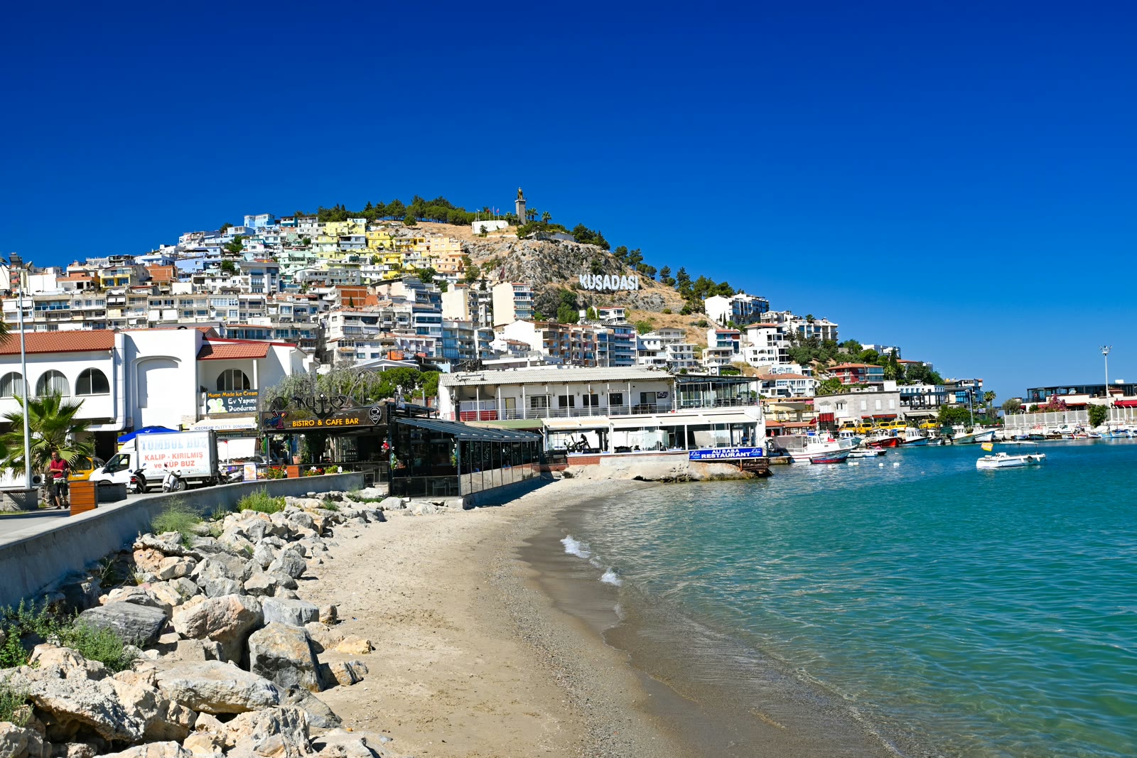 Beach with buildings in Kusadasi, Aydin, Turkey