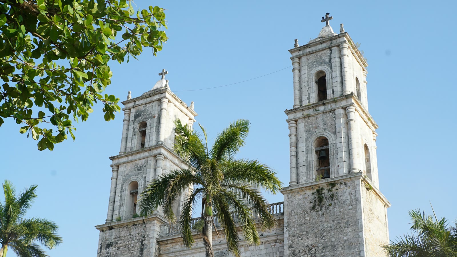 Large white church with two tall towers in Valladolid, Yucatan, Mexico