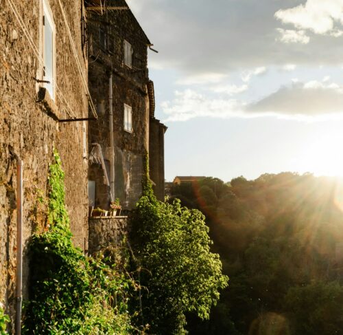 Sunlight streaming through windows of an ancient building in Viterbo, Lazio, Italy