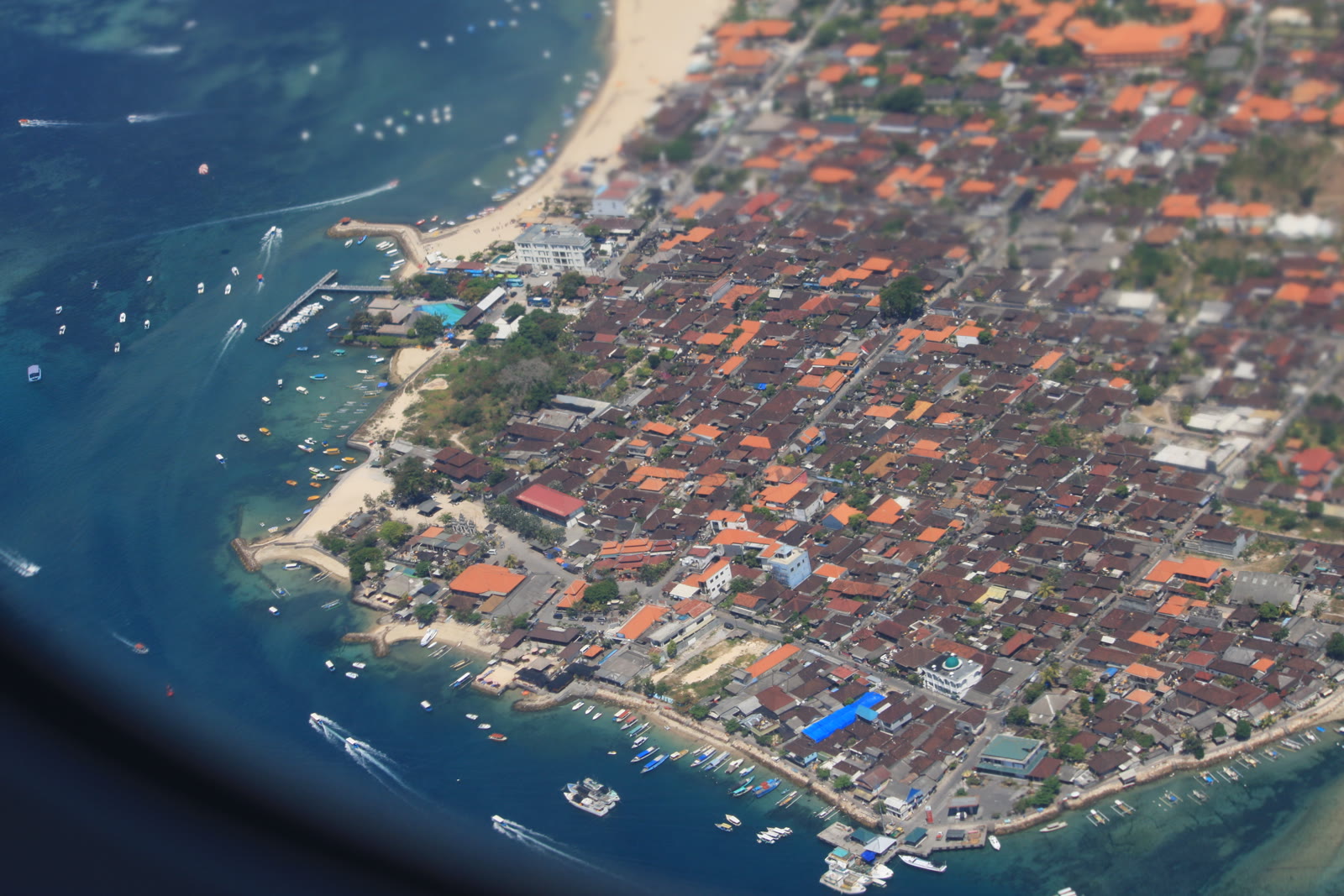 Aerial view of Denpasar, Bali, Indonesia from a plane after take-off