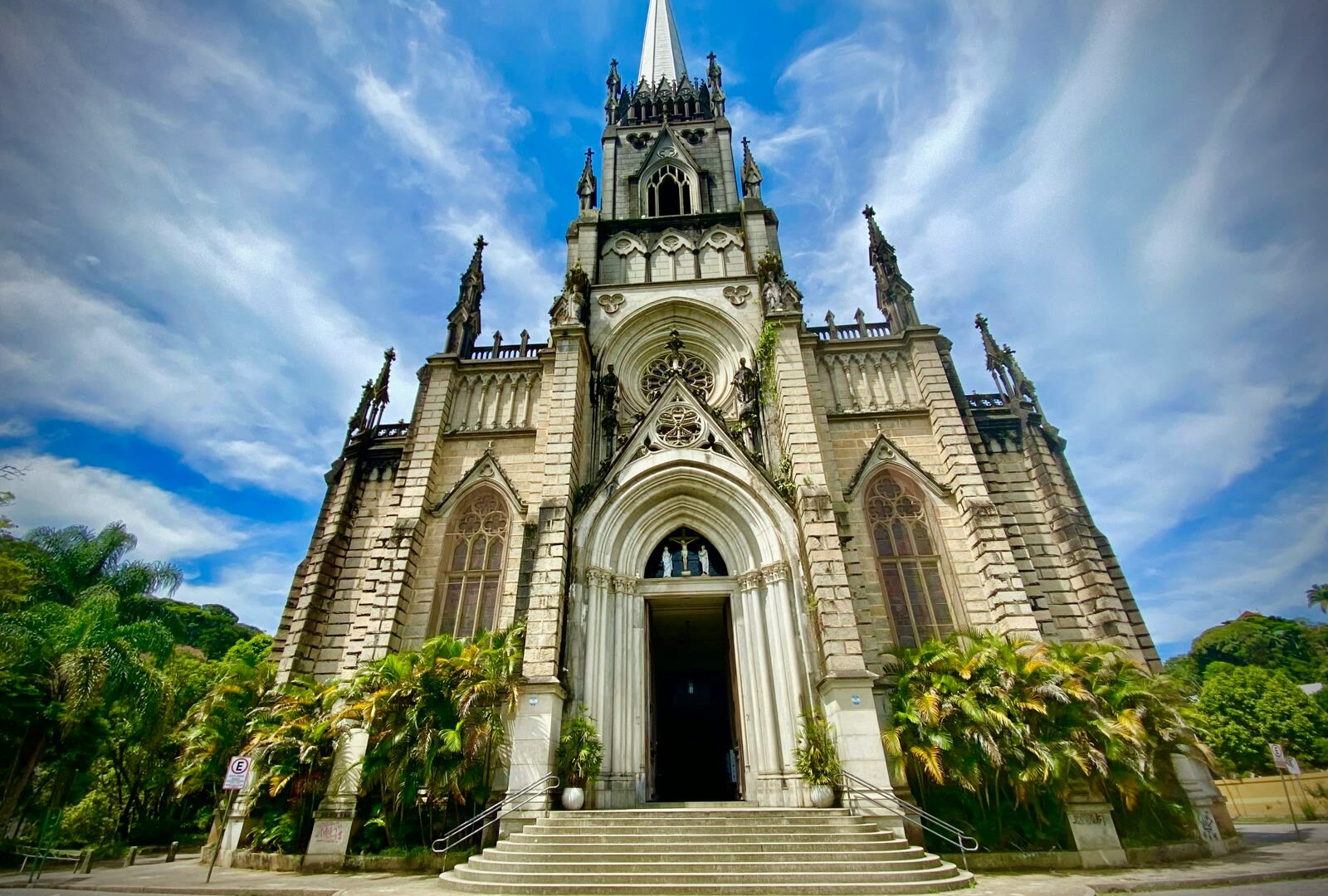 White and brown church under blue sky in Petropolis, Rio de Janeiro, Brazil