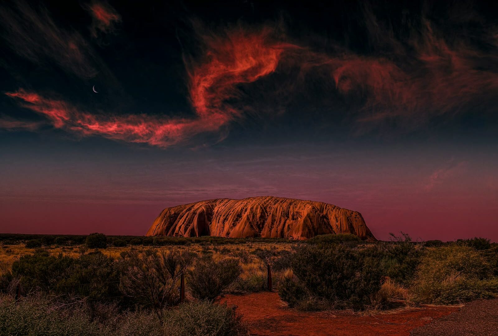 Large rock in the middle of a desert in Uluru, Northern Territory, Australia