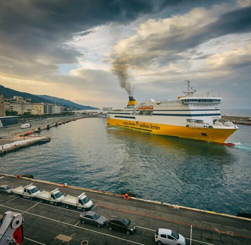 White and yellow ferry in the harbour of Bastia, Corsica, France
