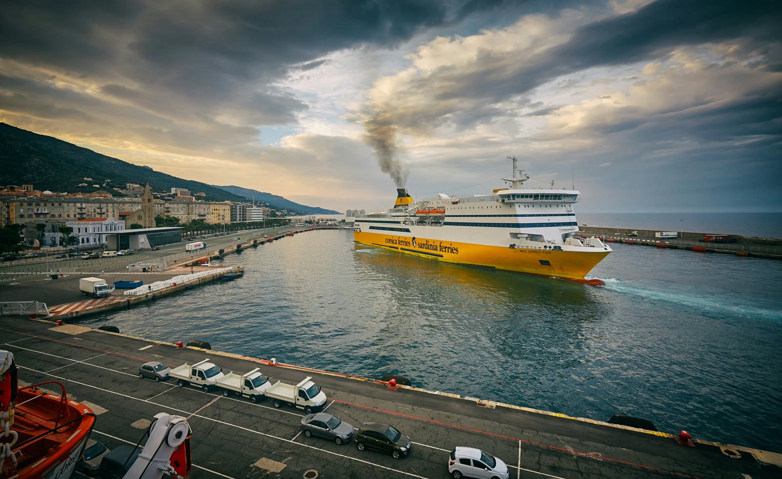 White and yellow ferry in the harbour of Bastia, Corsica, France