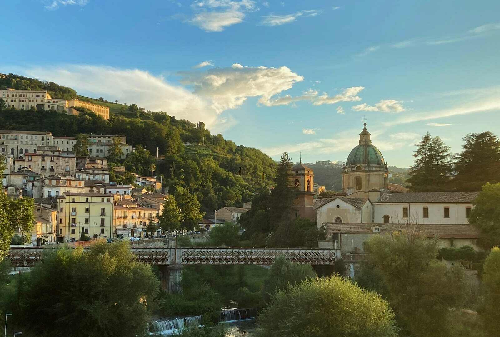 Panoramic view of Cosenza with a bridge over the river, Calabria, Italy