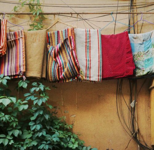 Colorful textiles hanging on a wall in Kashgar, Xinjiang, China