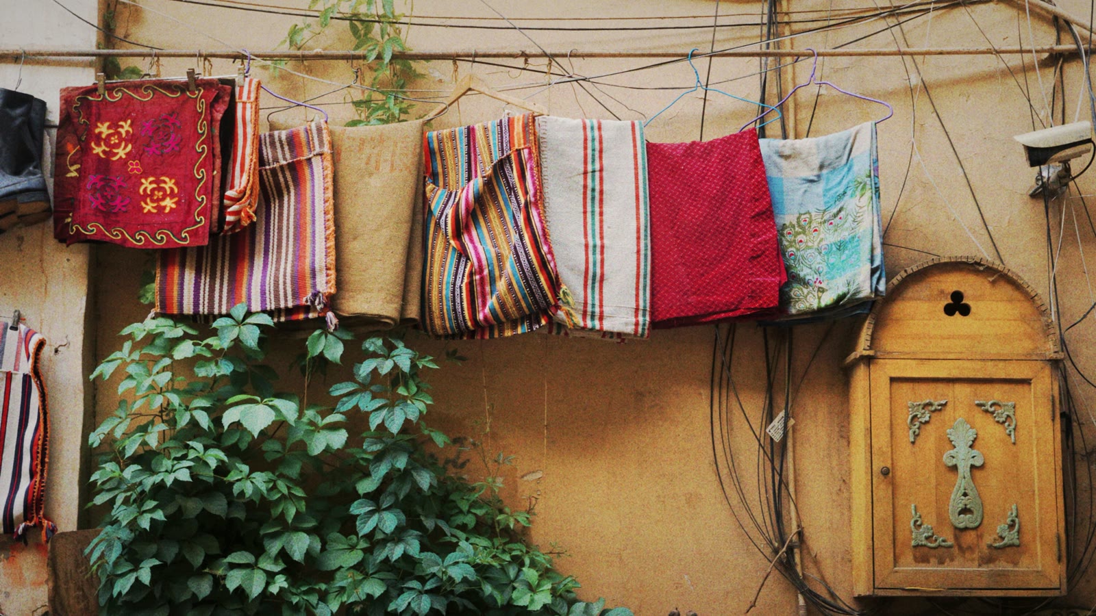 Colorful textiles hanging on a wall in Kashgar, Xinjiang, China