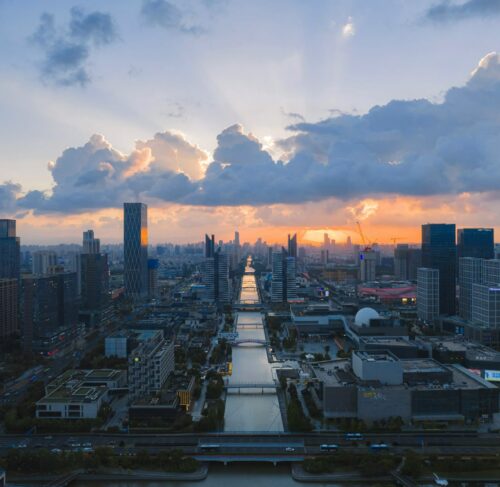 City with a river running through it in Ningbo, Zhejiang, China