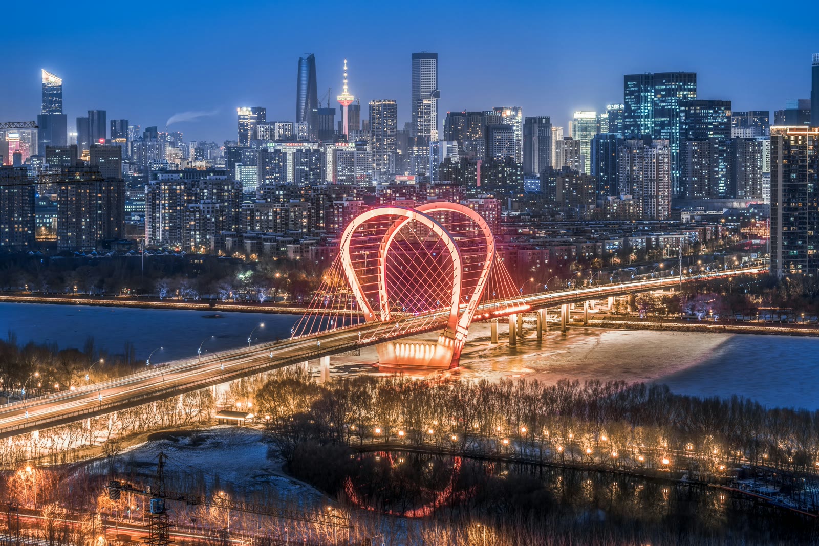 Ferris wheel in the city at night in Shenyang, Liaoning, China